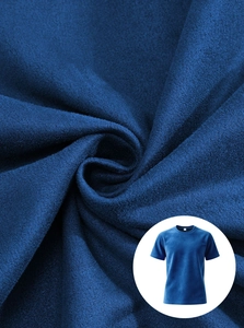 Detailed macro view of the soft brushed texture on the navy blue cotton t-shirt fabric