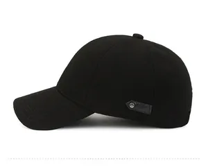 Side view of a black winter baseball cap featuring textured knit fabric and leather trim