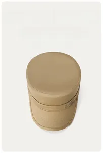 Macro detail of khaki flat top army cap showing SPIRIT logo and reinforced stitching
