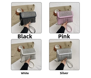 Detail of studded crossbody bag with fringe chain straps in black pink white and silver