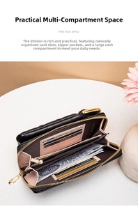 Detail view of the multi-slot interior in black quilted purse with pink lining