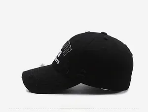 Side view of black distressed baseball cap with white Detroit 3D embroidery and vintage holes