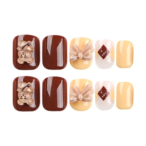 Short round press-on nails with 3D teddy bears, bows, and brown diamond patterns