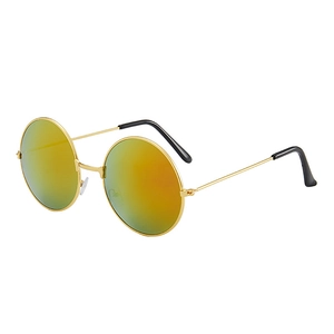 Detail view of round vintage sunglasses with gold frame and yellow reflective mirror lenses
