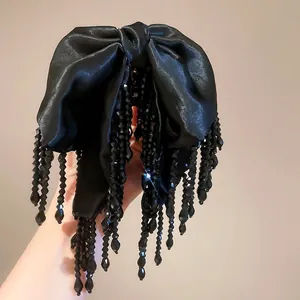 Pince à cheveux grand nœud satin noir avec pampilles perlées élégantes pour femmes