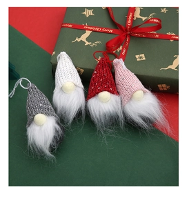 Set of four plush Christmas gnomes with sequin hats and white faux fur beards hanging