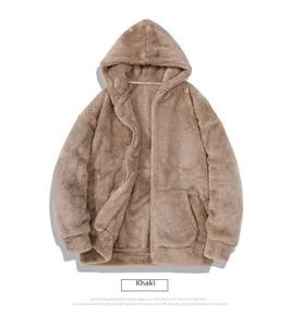 Close-up of khaki polar fleece hoodie showing soft sherpa texture and front pocket