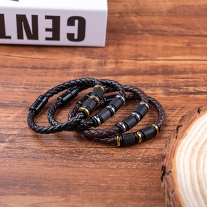 Set of four woven PU leather bracelets for men with magnetic clasps and metal beads