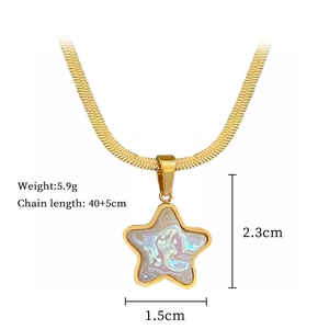 Detail view of a gold star pendant necklace with 18k gold plating and dimension specs