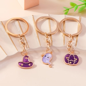 Halloween purple enamel keychain set with ghost, pumpkin and wizard hat charms