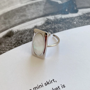 Macro shot of S925 sterling silver ring with rectangular mother of pearl inlay