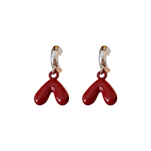 Minimalist red heart drop earrings with silver C-hooks and glossy enamel finish