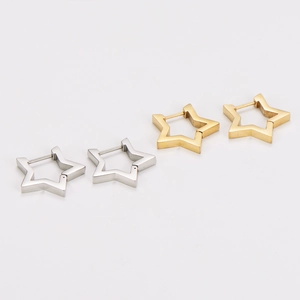 Minimalist stainless steel star hoop earrings in gold and silver finishes on white background