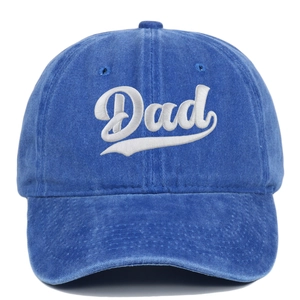 Close-up of the vintage washed blue cotton fabric with detailed white Dad embroidery