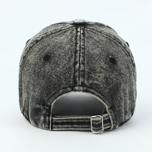 Detailed back view of washed denim baseball cap with adjustable metal buckle and stitching