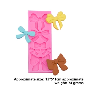 Detailed view of pink bow-shaped silicone mold with size 15x5x1cm for DIY baking