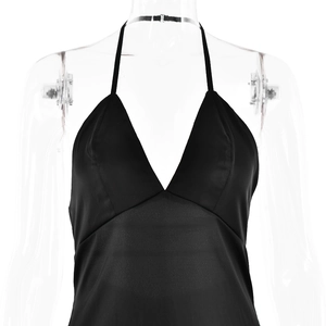 Detailed view of the deep V-neck and halter neckline on this black satin evening dress