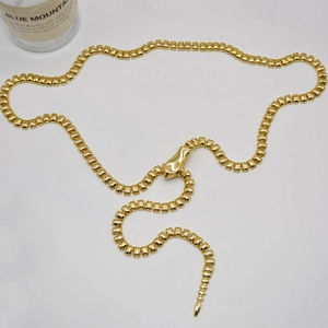 Punk style flexible gold snake chain belt accessory with polished metal joints