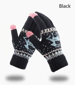 Detailed close-up of black knitted gloves with pink touchscreen tips and elk patterns