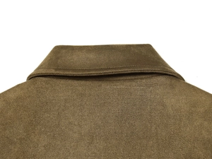 Close-up of olive green faux suede jacket collar with reinforced double stitching detail