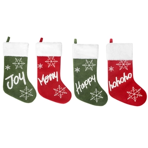 Set of four red and green plush Christmas stockings with festive Joy and Merry patterns
