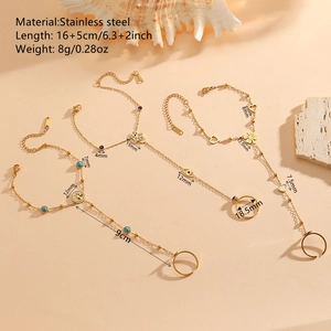 Gold plated stainless steel finger bracelet set with heart and flower charms