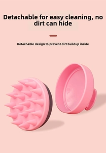 Close-up of pink detachable scalp massage brush showing the inner structure and soft bristles