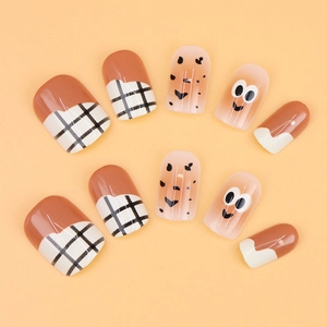 Cute plaid and leopard print press-on nails with smiling face designs in warm brown tones