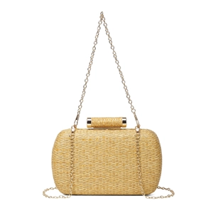 Detail of beige woven evening clutch bag featuring a golden cylindrical metal clasp