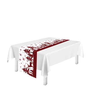 Red and black buffalo plaid Christmas table runner with reindeer and snowflake patterns