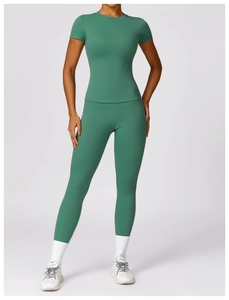 Front view of green high-stretch quick-dry yoga set including t-shirt and leggings