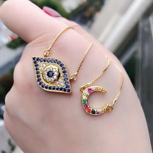 Gold moon necklace with blue evil eye and colorful zircon pendant for women