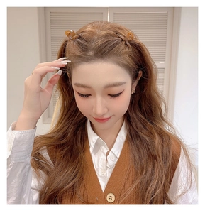 Model wearing translucent amber claw clips for half-up hair styling, 4.5cm small size