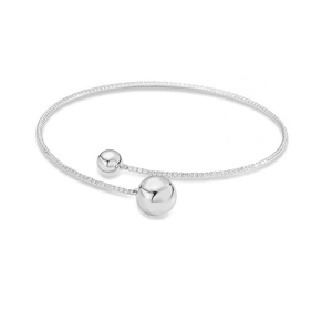 Close-up of silver bangle featuring cubic zirconia pavé and polished metal beads