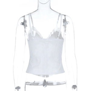 Detail of white lace camisole showing backless design and delicate hollow patterns