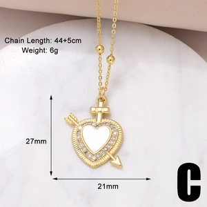 Detailed view of heart pendant with colorful zircon and cross showing 21x27mm size