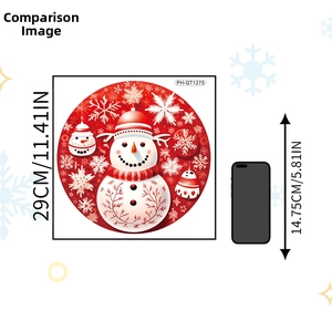 Size comparison of a 29cm snowman Christmas sticker next to a mobile phone reference