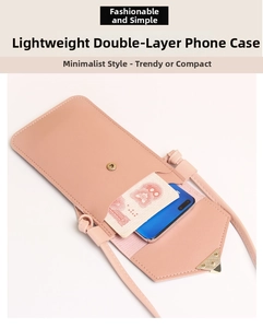 Detail of pink crossbody phone bag with two compartments and smooth metal snap closure