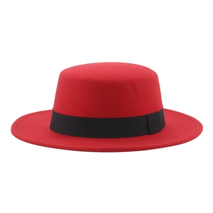 Classic red wool felt flat top boater hat for kids featuring a wide black ribbon trim