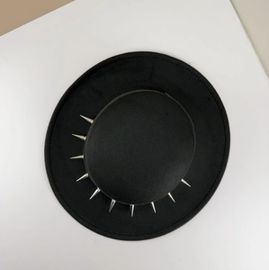 Detailed top view of a black wool fedora featuring silver punk style metal cone studs