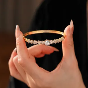 Luxurious gold-plated flower bracelet featuring sparkling cubic zirconia for women
