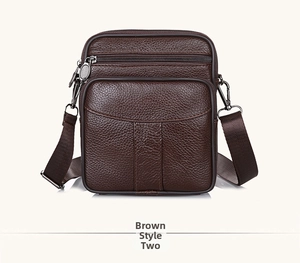 Macro shot of dark brown pebbled leather texture and metal zipper on men's business bag