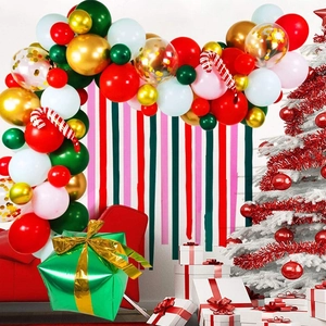 Detailed Christmas balloon arch with candy cane and gift box foil balloons for festive party decor
