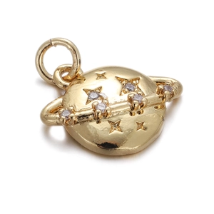 Macro view of gold planet pendant with sparkling crystals and polished finish