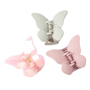 Three-piece butterfly hair claw clips in matte beige, pearlescent pink and matte pink