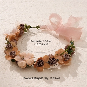 Close-up of pink rose floral wreath headband with ribbon and size parameters detail