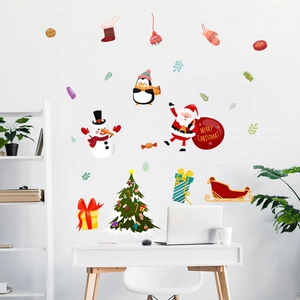 Christmas wall stickers with Santa, snowman and penguin in a bright home office setting