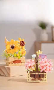 Detailed view of colorful building block flower baskets with sunflower and rose models