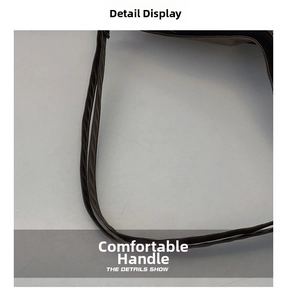 Detailed close-up of dark brown soft PU leather shoulder strap with double stitching