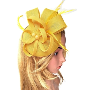 Elegant yellow fascinator hat with mesh flowers and feathers for wedding parties